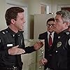 G.W. Bailey and Lance Kinsey in Police Academy 4: Citizens on Patrol (1987)