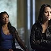 Melissa O'Neil and Melanie Liburd in Dark Matter (2015)