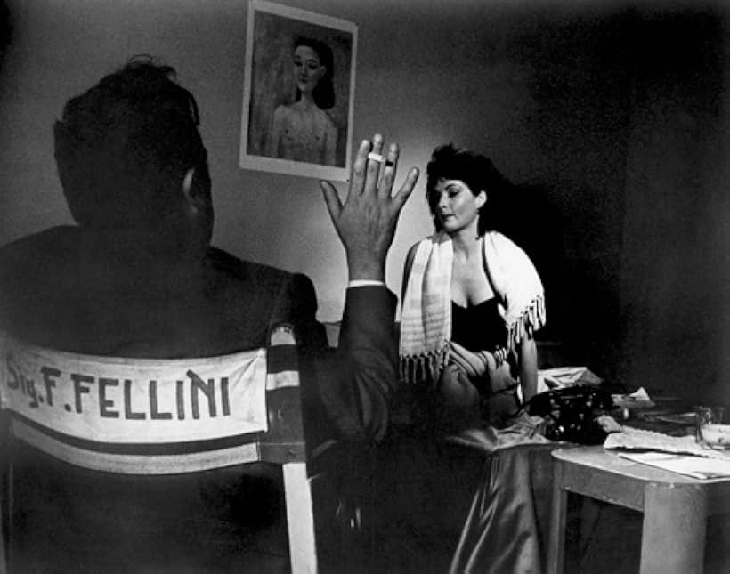 Federico Fellini and Yvonne Furneaux in La dolce vita (1960)