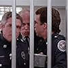 G.W. Bailey, Lance Kinsey, and George R. Robertson in Police Academy 4: Citizens on Patrol (1987)