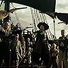 Johnny Depp, Geoffrey Rush, Orlando Bloom, Naomie Harris, Martin Klebba, Keira Knightley, Reggie Lee, and Kevin McNally in Pirates of the Caribbean: At World's End (2007)