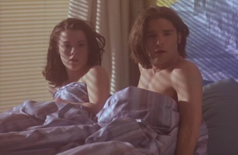 Corey Feldman and Kathleen Robertson in Blown Away (1992)