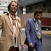 Christian Bale and Jeremy Renner in American Hustle (2013)