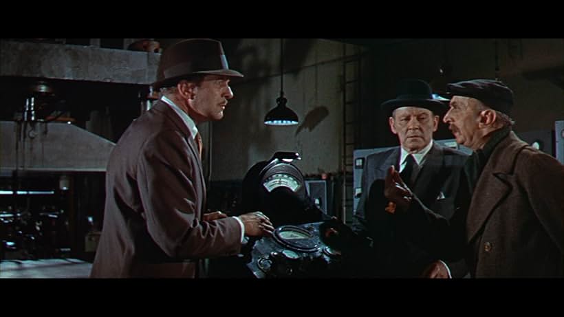 Vincent Price, Herbert Marshall, and Arthur Dulac in A Mosca da Cabeça Branca (1958)