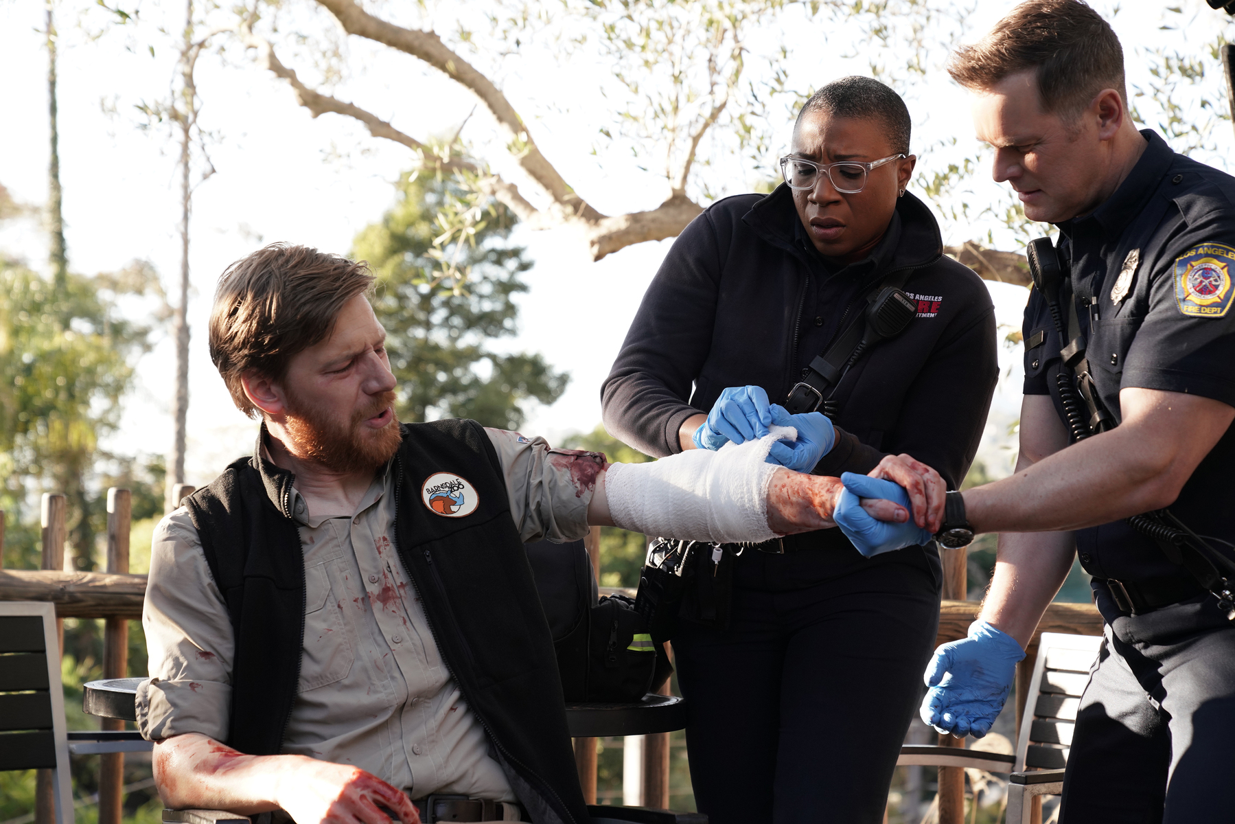 Peter Krause, Aisha Hinds, and Brian Maillard in 9-1-1 (2018)