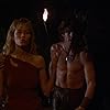 Monique Gabrielle and John Terlesky in Deathstalker II (1987)