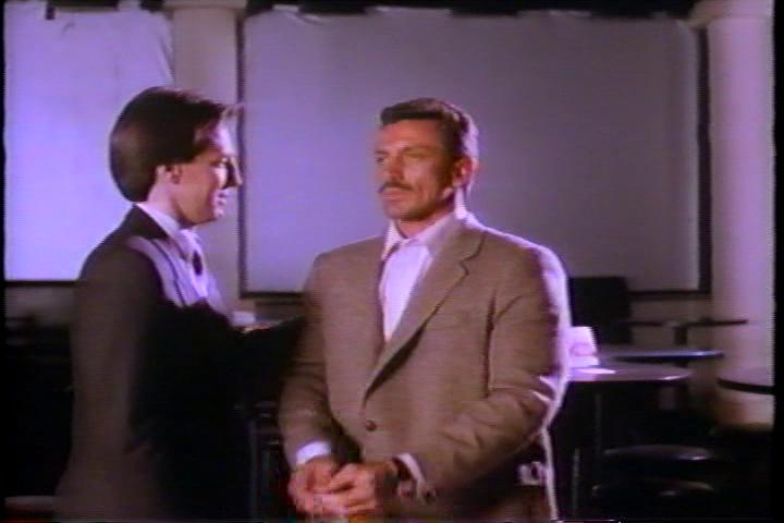 Walter Cox and Jeff Herbick in Deadly Dancer (1990)