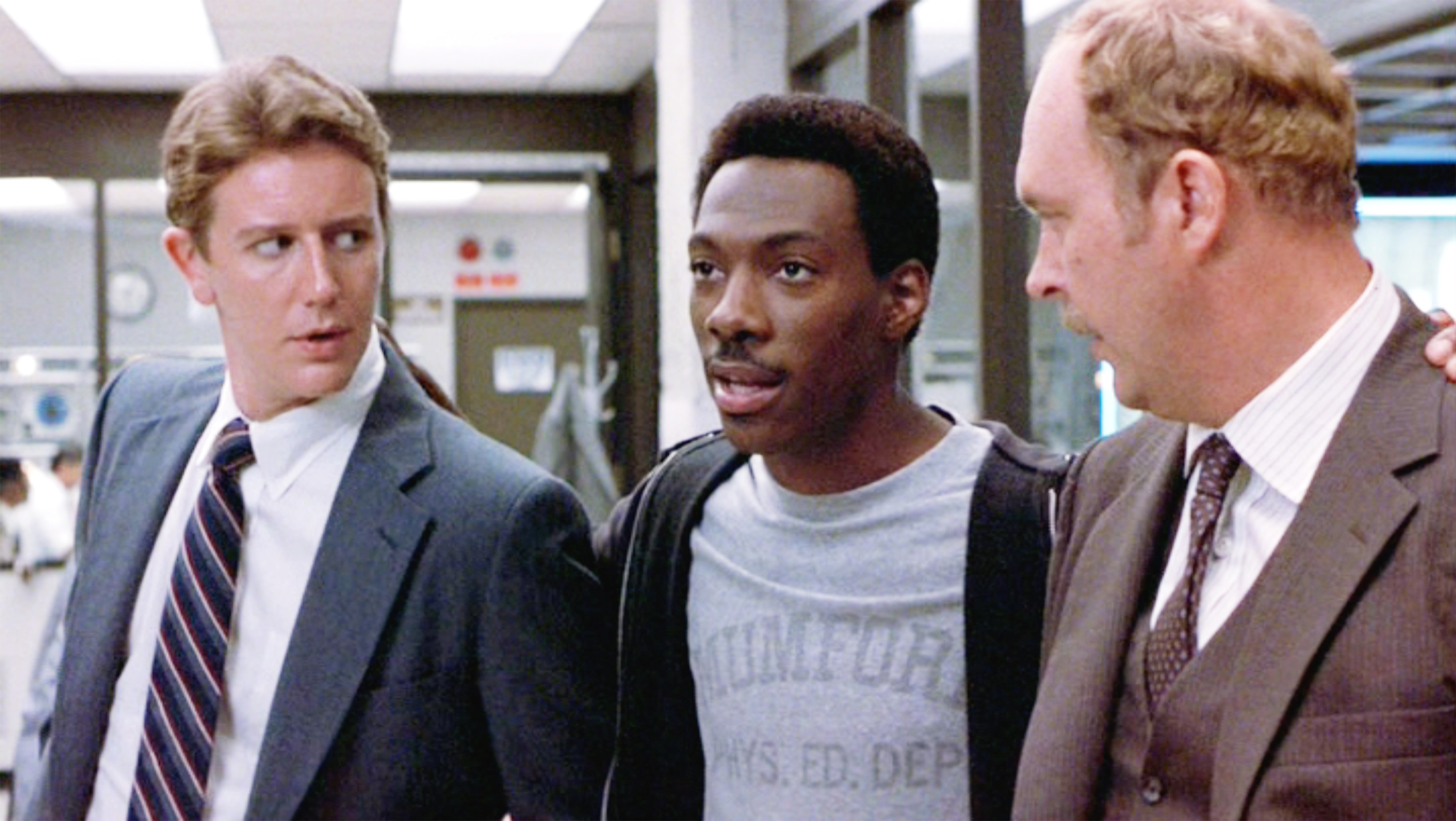 Eddie Murphy, Judge Reinhold, and John Ashton in Beverly Hills Cop (1984)