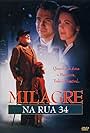 Richard Attenborough, Dylan McDermott, Elizabeth Perkins, and Mara Wilson in Milagre na Rua 34 (1994)