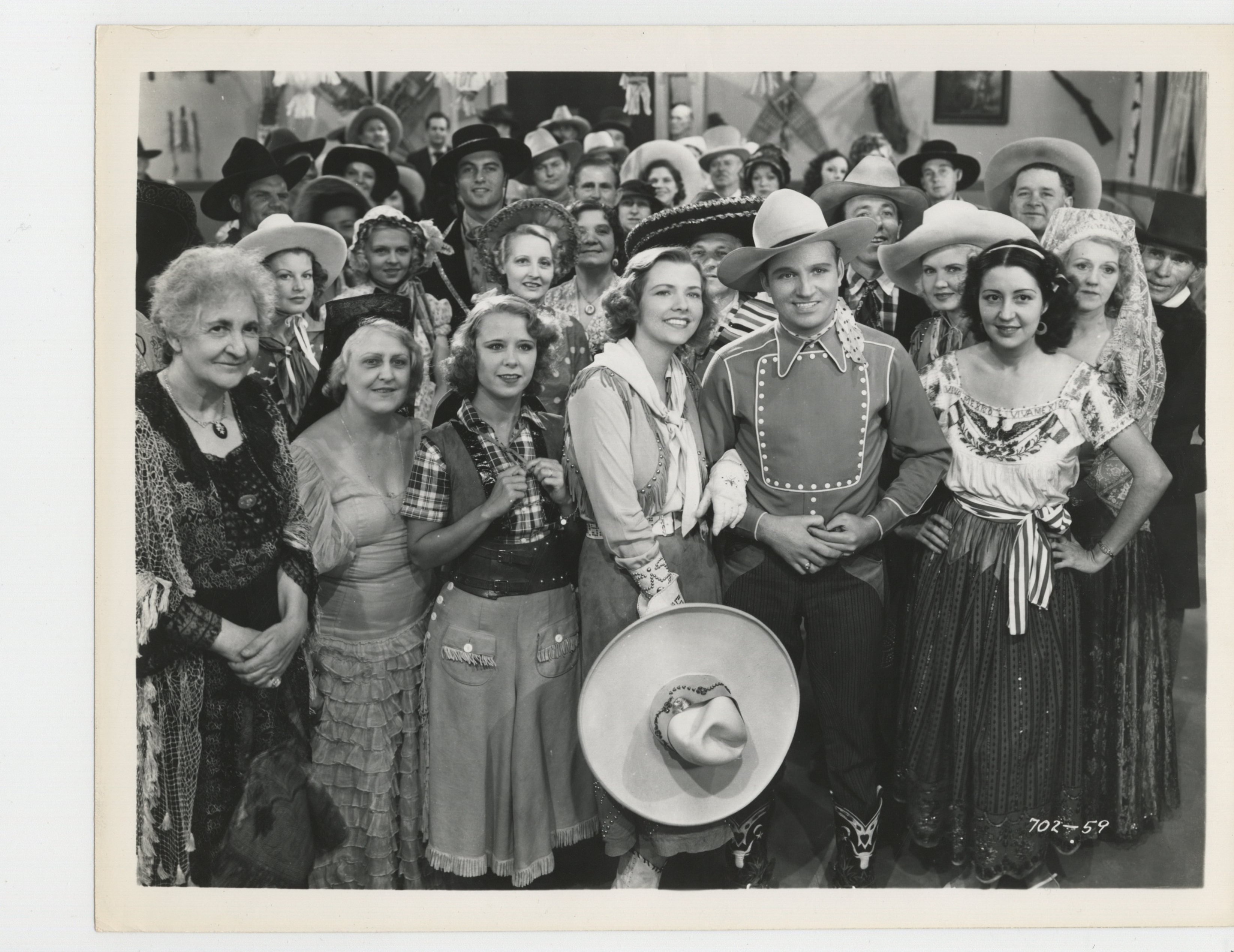 Gene Autry, Ruth Bacon, Smiley Burnette, Fred Burns, Victor Cox, Robert Dudley, Jane Hunt, Jack Kirk, Ula Love, George Montgomery, Polly Rowles, and Rudy Sooter in Springtime in the Rockies (1937)