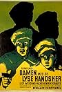 Damen med de lyse handsker (1942)