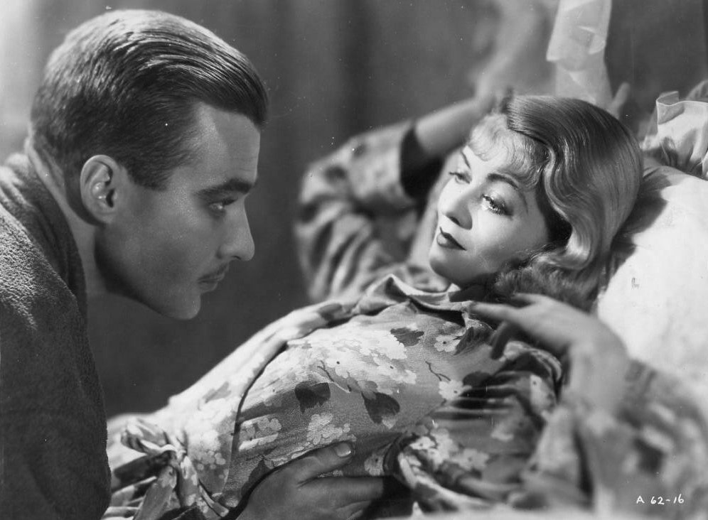 Constance Bennett and Douglass Montgomery in Everything Is Thunder (1936)