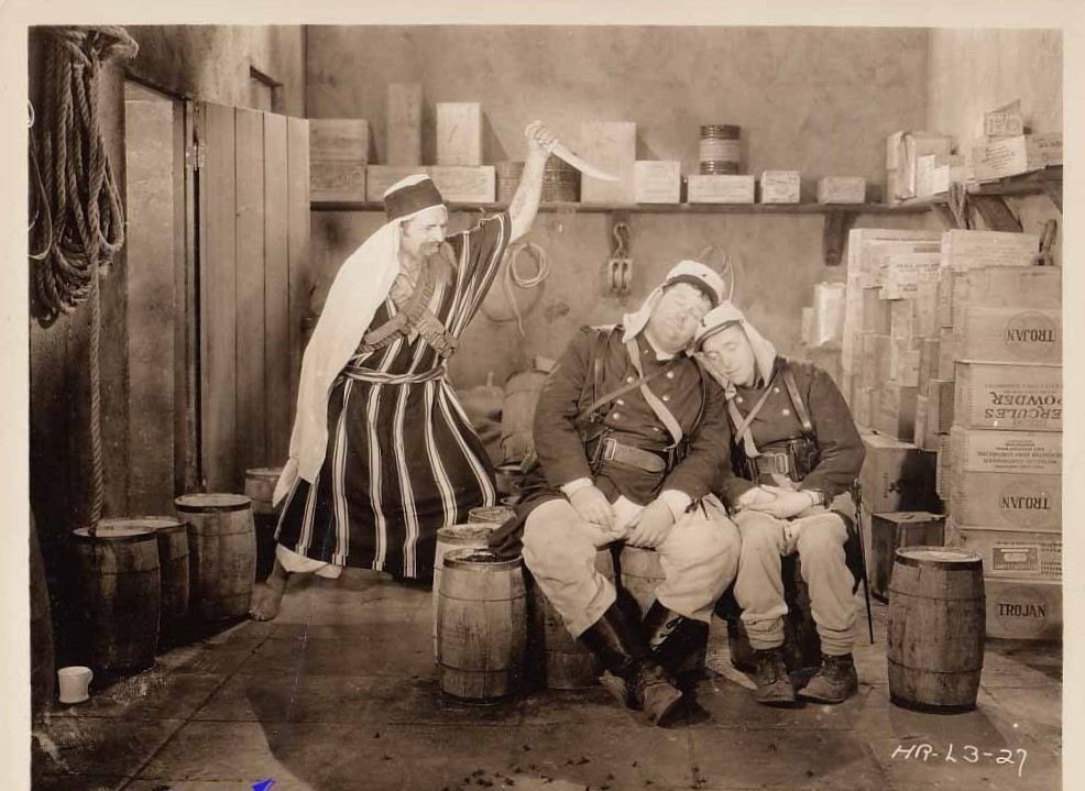 Oliver Hardy, James W. Horne, and Stan Laurel in Beau Hunks (1931)