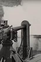 A Maxim Gun in Action (1897)