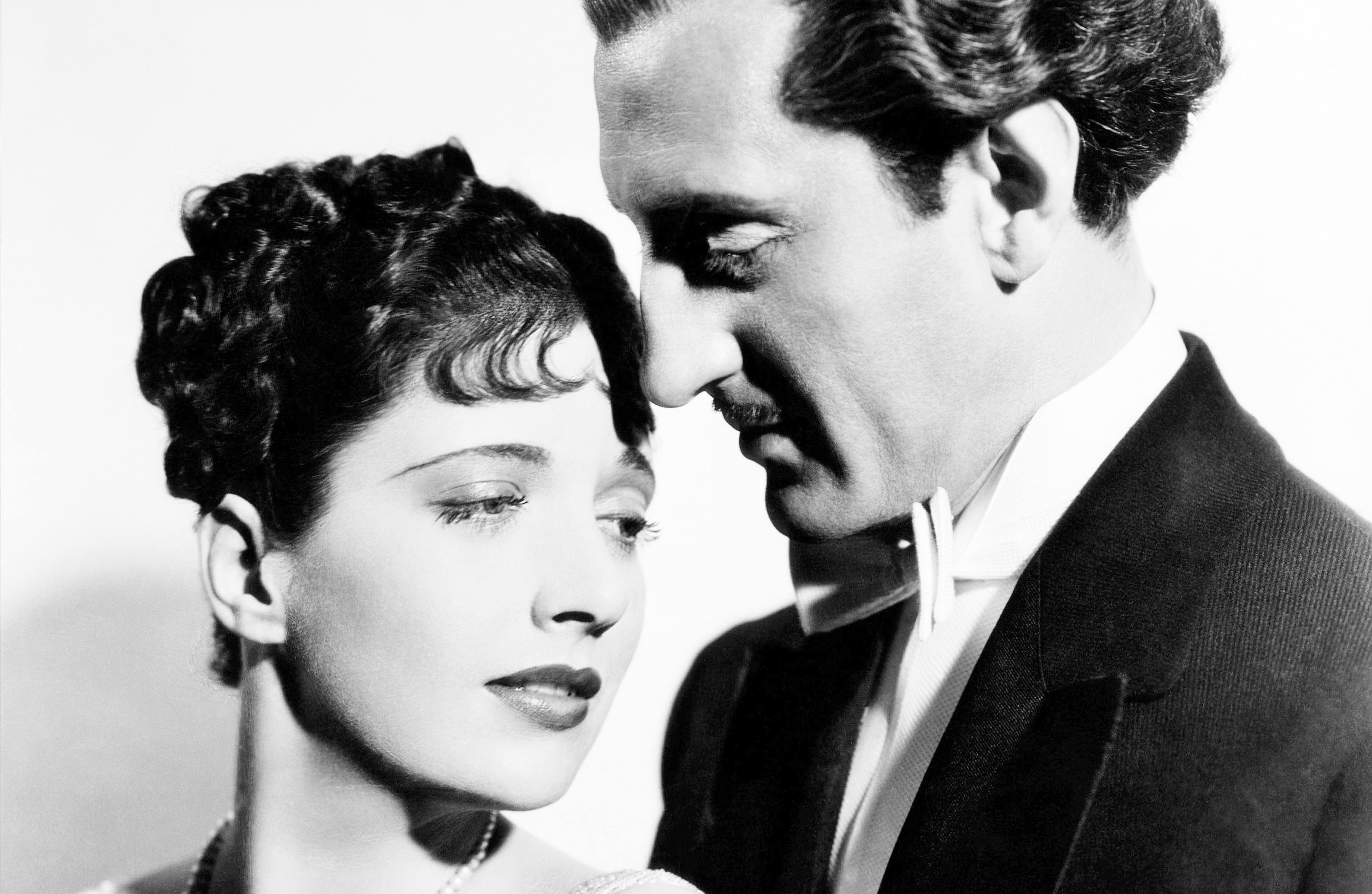 Basil Rathbone and Kay Francis in Confession (1937)