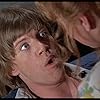 Robin Askwith and Christine Donna in Confessions of a Window Cleaner (1974)