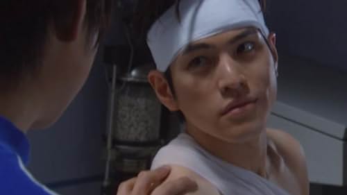 Hidekazu Ichinose in Ultraman Cosmos (2001)