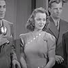 Bruce Bennett, Carole Landis, Charles Quigley, and David Sharpe in Daredevils of the Red Circle (1939)