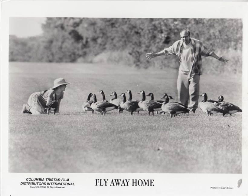 Anna Paquin and Terry Kinney in Fly Away Home (1996)