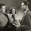 Janet Blair, Janis Carter, and Franchot Tone in I Love Trouble (1948)