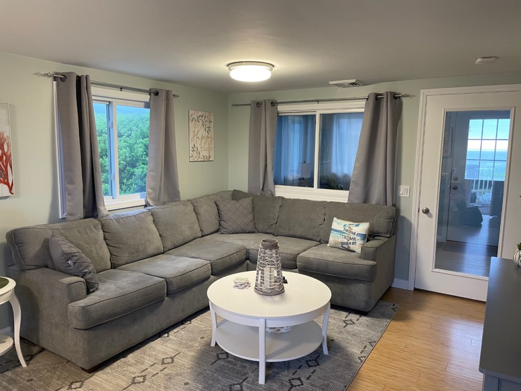 Living room setting in beachy cottage