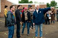 A SERIOUS MAN, foreground from left: writer/directors Ethan Coen, Joel Coen, first assistant director Betsy Magruder, cinematographer Roger Deakins, on set, 2009. ph: Wilson Webb/©Focus Features