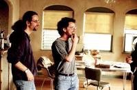 THE BIG LEBOWSKI, writer/producer Ethan Coen, writer/director Joel Coen on set, 1998, (c) Gramercy Pictures