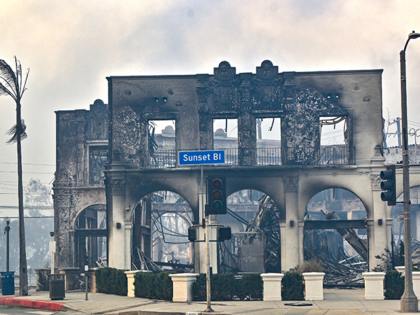 PCIFIC PALISADES, CA - January 08: A burned building on Sunset Boulevard during the Palisa