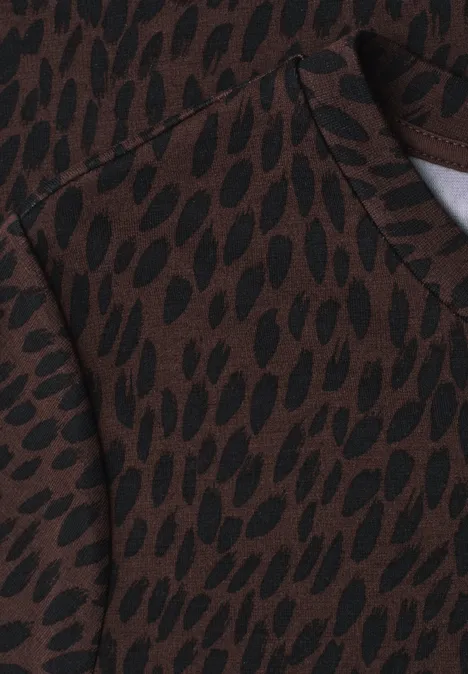 Midi-jurk met grafisch patroon molten earth Bruine stof met onregelmatig zwart druppelpatroon, doet denken aan een trui of hoodie.