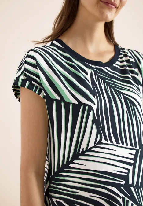 Knielange jersey jurk palm breeze green Vrouwelijk bovenlichaam met geometrisch gestreept t-shirt in zwart, wit en groen.