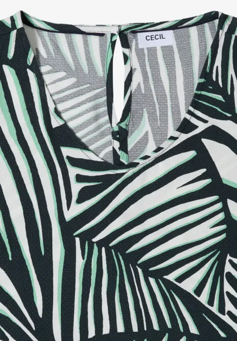 Knielange jurk met ronde V-hals universal blue Mouweloze top met zwart-wit zebraprint en groene palmbladeren