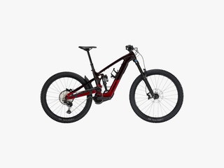 Side view of the Trek Slash Plus an electric mountain bike in black and red