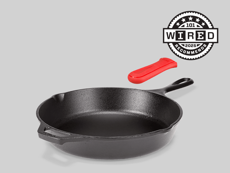 Image of a cast iron skillet and a handle that goes with it.