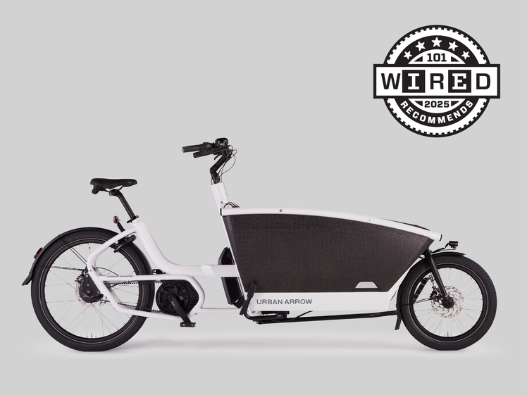 White cargo bike with big basket in the front