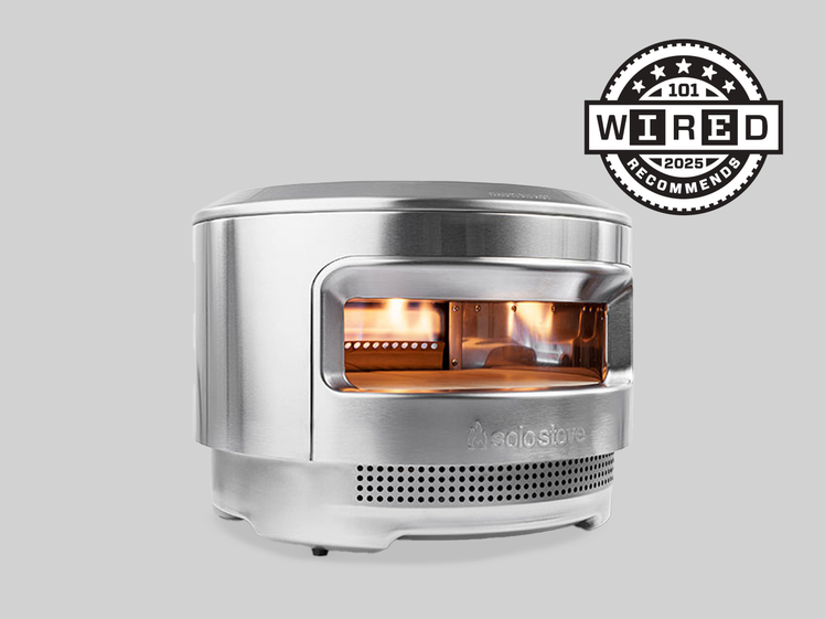 An aluminum pizza oven with fire