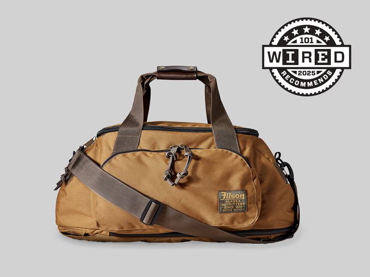 Tan and brown duffel bag