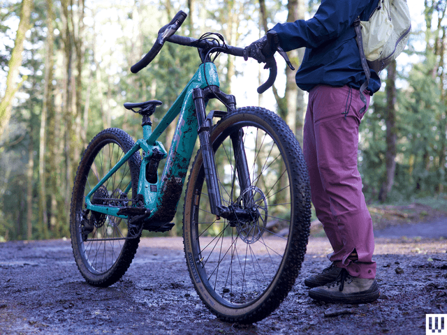 Image may contain Machine Wheel Bicycle Transportation Vehicle Person Clothing Glove and Mountain Bike