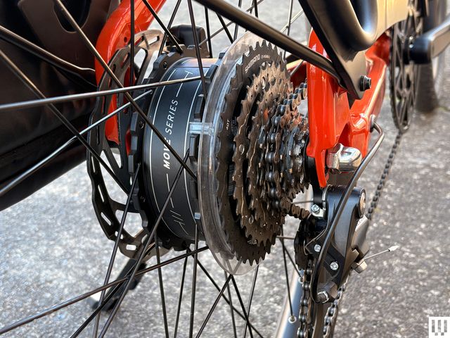 Image may contain Machine Spoke Wheel Coil Rotor and Spiral