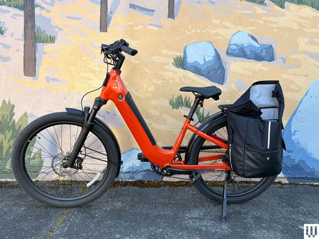 Image may contain Moped Motor Scooter Motorcycle Transportation Vehicle Machine Wheel and Bicycle