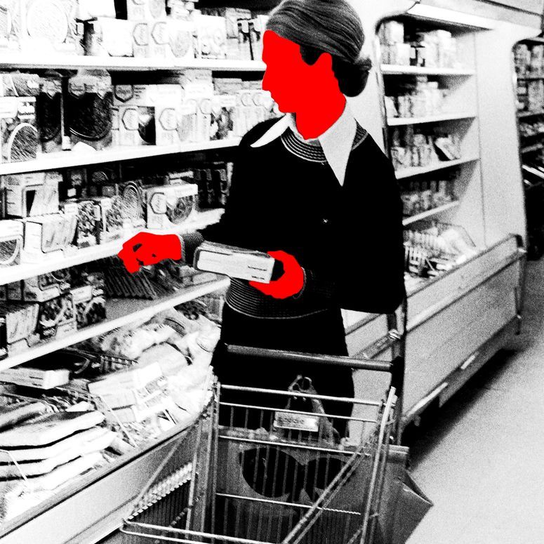 A photo illustration of a woman shopping with a red overlay over her face and hands.