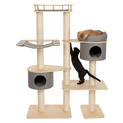 Cat tree with multiple levels, sisal posts, hammock and two caves. A black cat is climbing, an orange cat is resting on the top platform.