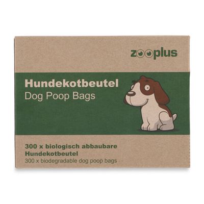 Négy zöld tekercs kutyaürülék-zacskó, fehér mancsnyom szimbólummal nyomtatva.