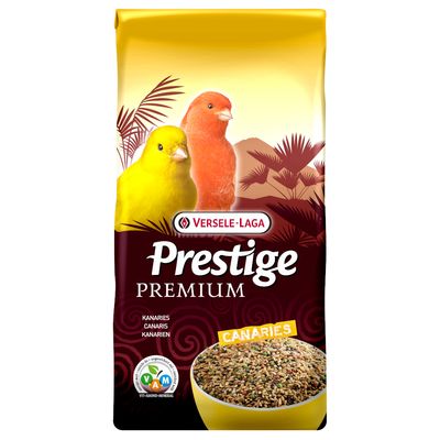 Versele-Laga Prestige Premium kanári eleség. VAM-tanúsítvány vitaminokra, aminosavakra és ásványi anyagokra. Sárga és piros kanári, valamint magos tál képe.