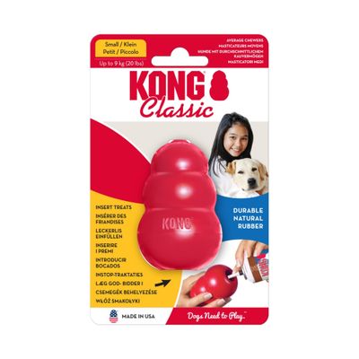 Juguete de goma roja KONG con inscripción 'KONG' visible. Esquina superior derecha con texto: Top ventas.