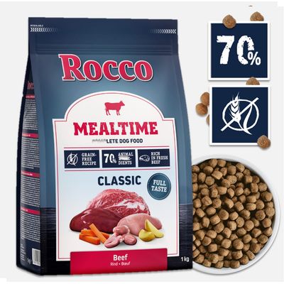 Rocco Mealtime Classic Beef, 1 kg. Widoczne: 70% składników zwierzęcych, bez zbóż, bogata w świeżą wołowinę. Opakowanie i miska z karmą.