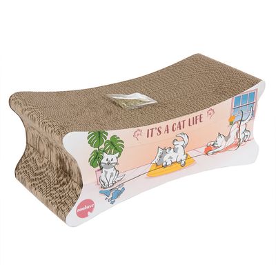 Cardboard scratching furniture with 'It's a cat life' inscription, two pieces, decorated with cat motifs. White cat stands on the top part.