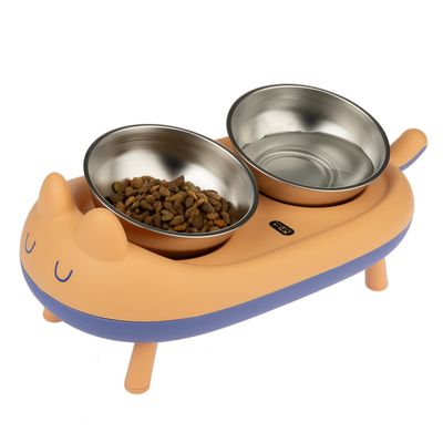 Doble comedero de acero inoxidable en diseño de gato naranja y azul, un cuenco con pienso y otro para agua.