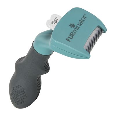 FURminator alat za njegu dlake s ergonomskom drškom i oštricom od nehrđajućeg čelika, vidljiv FURjector gumb za jednostavno čišćenje.