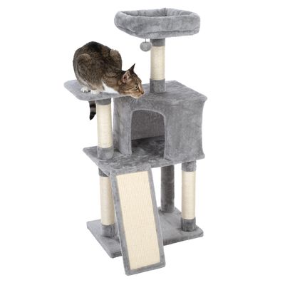 Grey scratching post with multiple levels, cave, top lying area, sisal scratching surfaces and slanted scratching ramp. Cat sits on the middle platform.