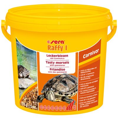 Envase amarillo de Sera Raffy I Carnivor, 370 g, con imágenes de tortuga y texto: 'Leckerbissen mit Gammarus', 'Tasty morsels with gammarus', 'Friandise avec des gammares'.